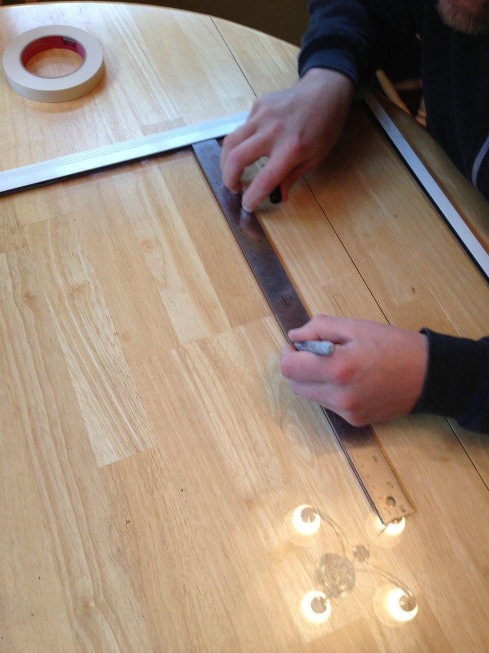 We are making a Kanban board, dividing it into three sections prior to painting the white on. You can also make a calendar board or anything else you want, or leave it blank too.