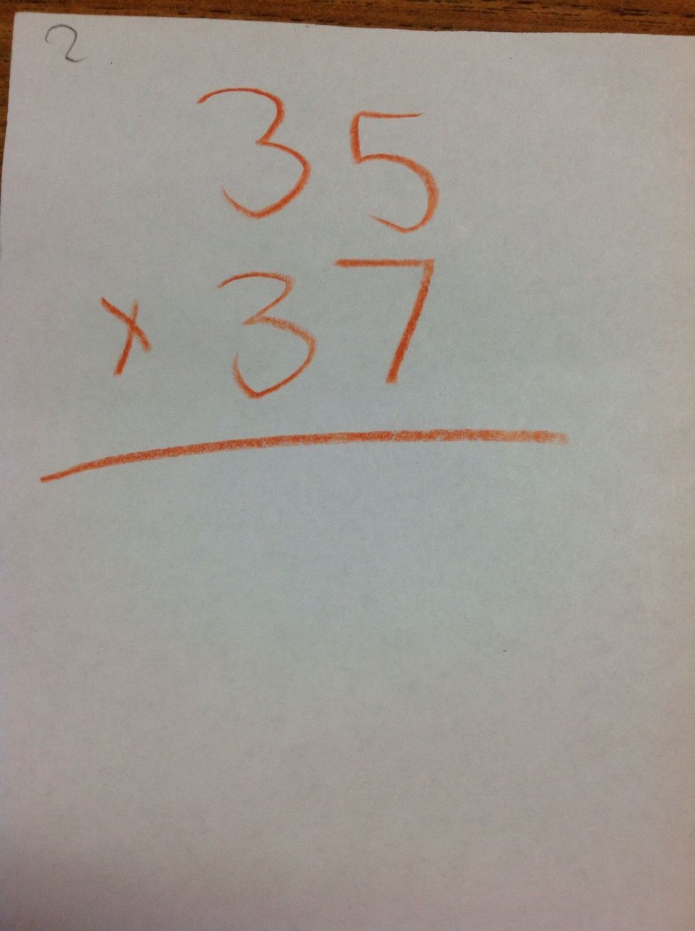 We begin with a 2 by 2 digit multiplication problem