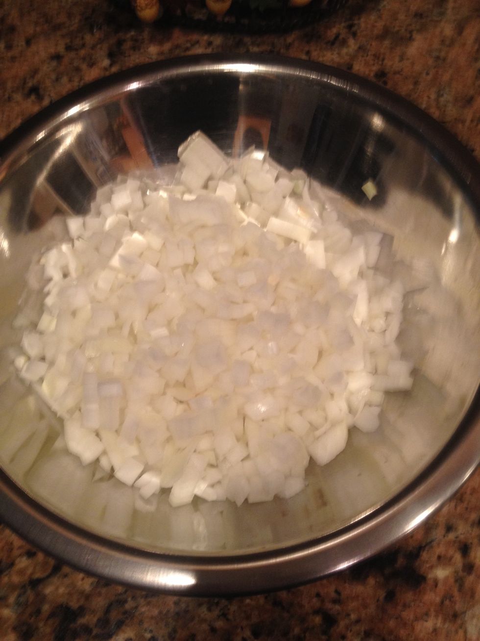 We begin with prep. Start by dicing the onions