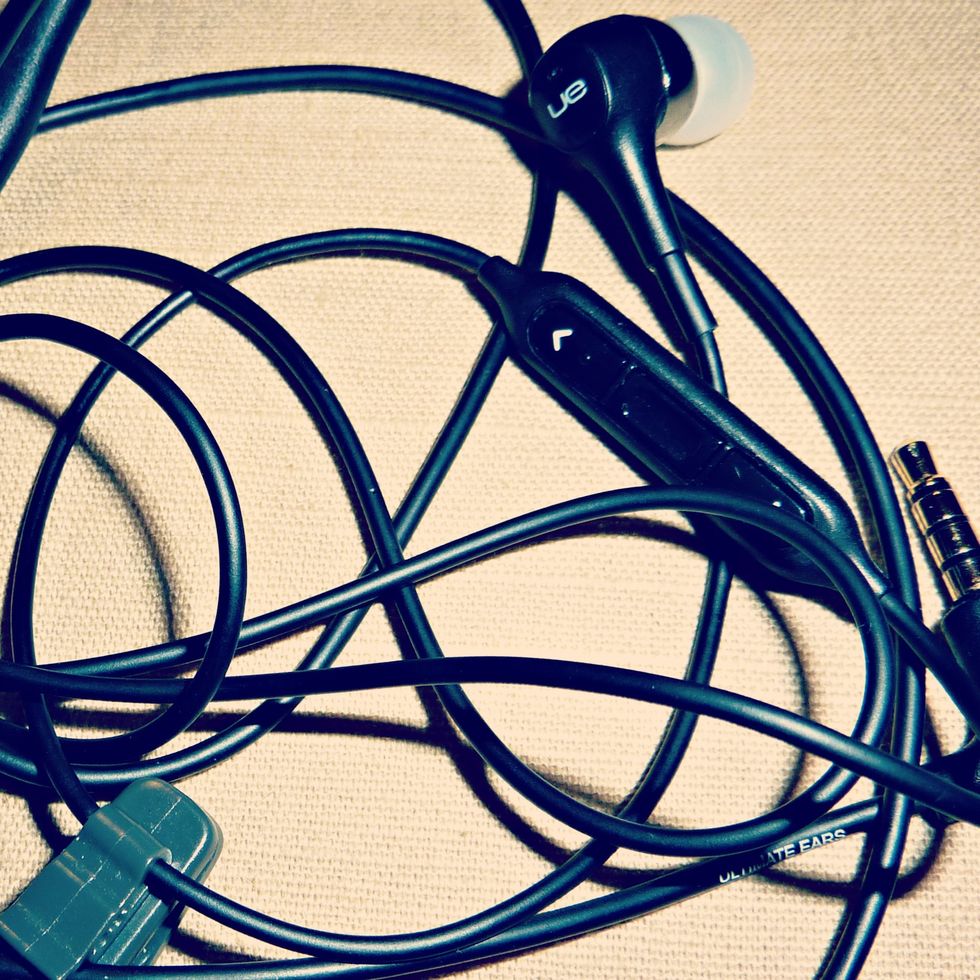 We can spend a lot on our headphones, & they often end up getting tangled, or ruined in our bags. Here is an inexpensive solution that couldn't be more simple that I found on iheartorganizing's blog.