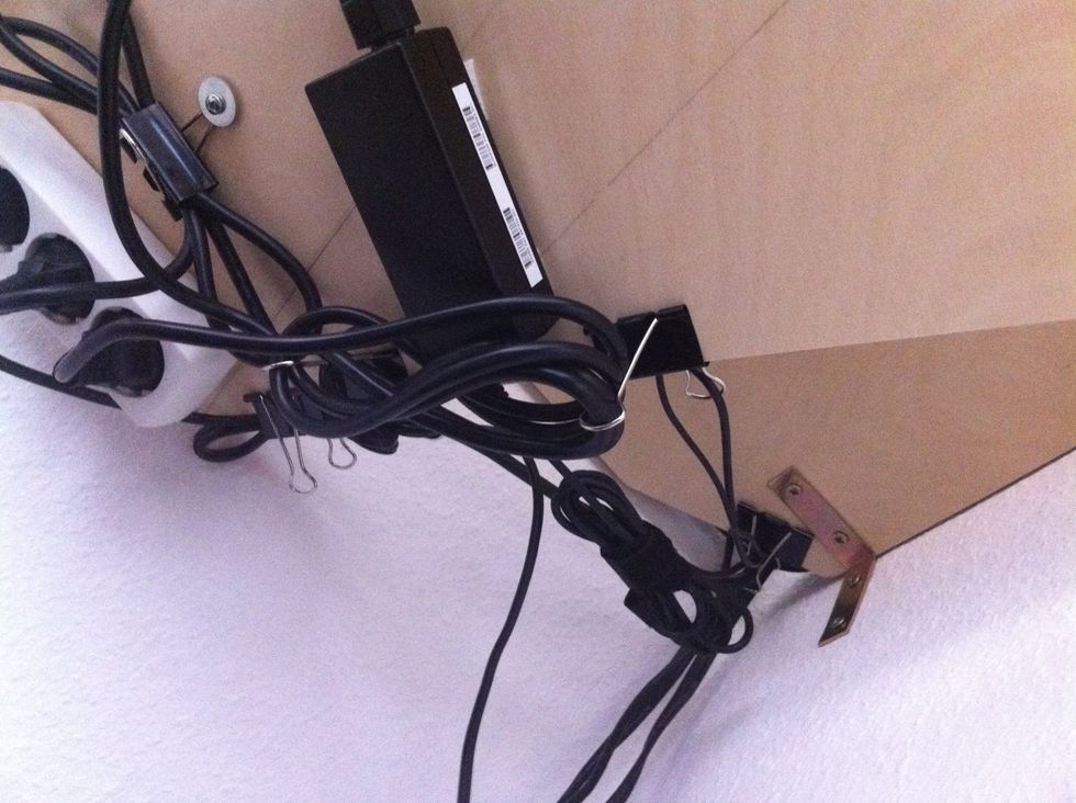 We did the cable management using binder clips, a nice idea we got from Lifehacker. This way you won't see the cables unless you kneel down.