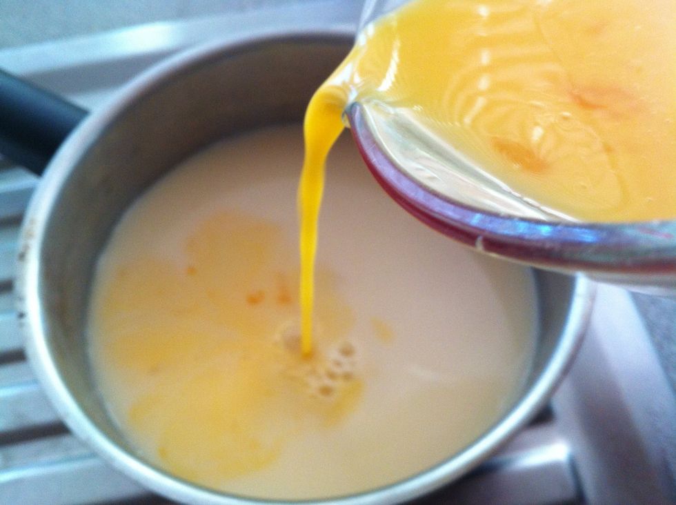 We don't want bubbles that inevitably form from whisking. Strain through a very fine mesh strainer\u2013this step is extremely important to getting a smooth, glassy egg tart.