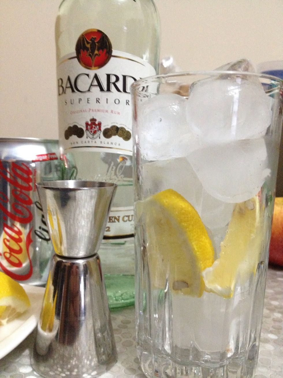 We dont want the wedges to float on top of the cocktail so we need to arrange them at the bottom with ice on top of them.