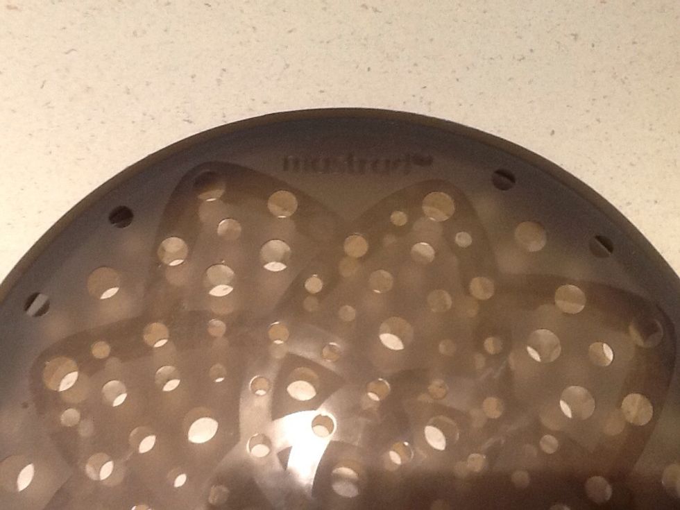 We found this at Bed Bath and Beyond. It comes with a small mandolin and instructions.