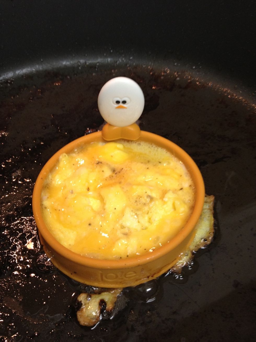 we found this "roundy egg" at Vons! it helps to keep the scrambled egg contained so that it fits on the sandwich. if you're not sold on corny kitchen gadgets, cookie cutters will work.