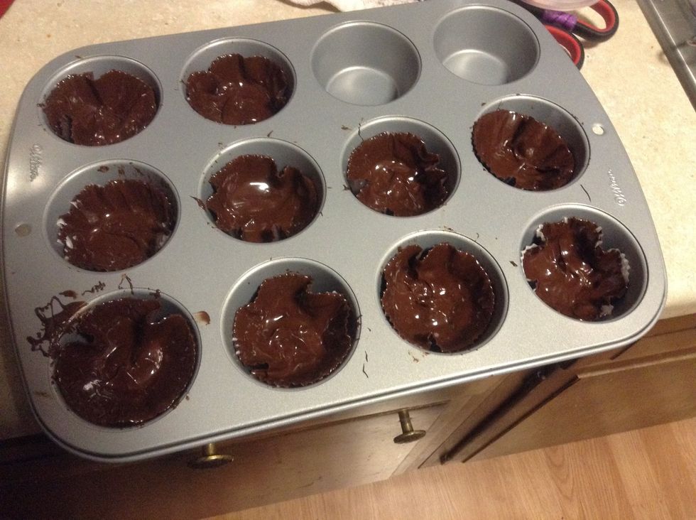 We just want to put a thick coat all over the paper and a little on the bottom. Put in the fridge to harden