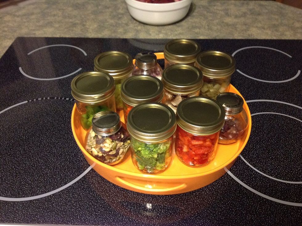 We like a lot of variety so I have pickles, mushrooms, red onions, olives and other treats cut up and ready to go too. I don't pre-cut tomatoes or cucumbers though since they don't hold up very well.