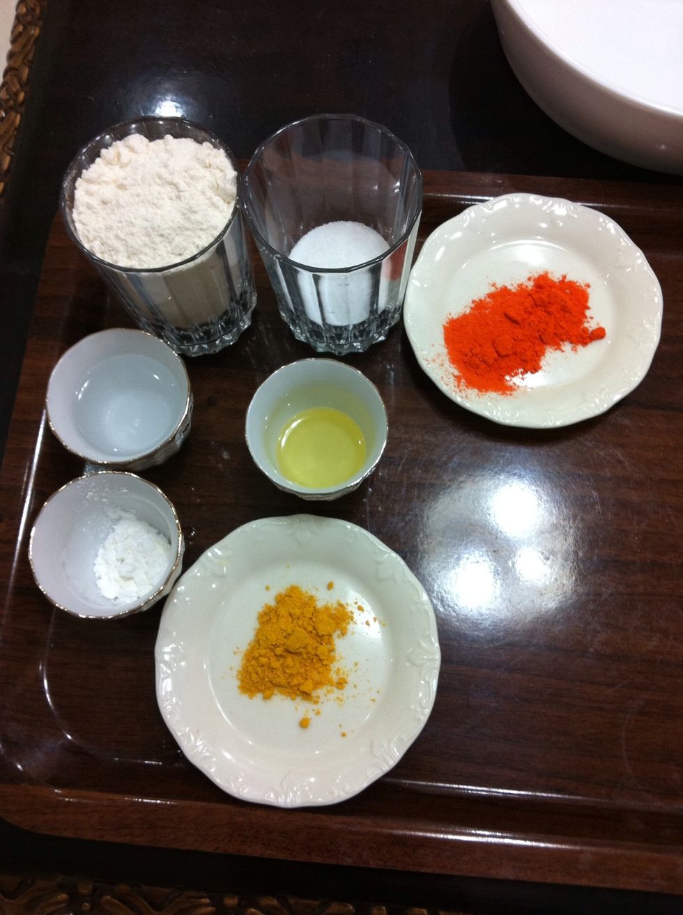 We need cup of flour, 1/4 cup of salt, 1/4 cup of water , spoon of cornstarch, spoon of corn oil, food coloring