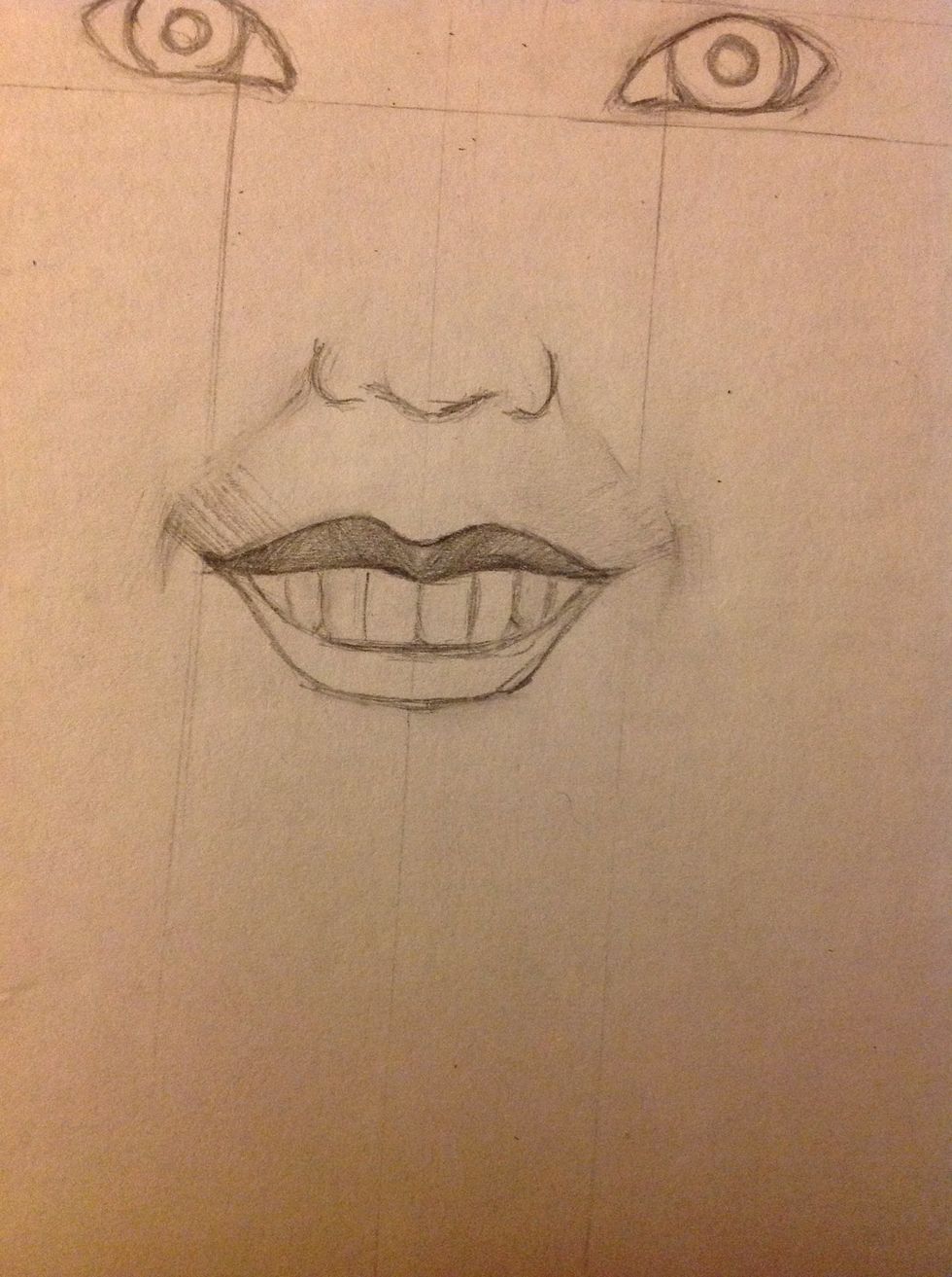 We need to make the shadows, so make them with a pencil as you can see in the left of the mouth, then blur them until they look like the corner of the right. Paint the upper lip truly dark.