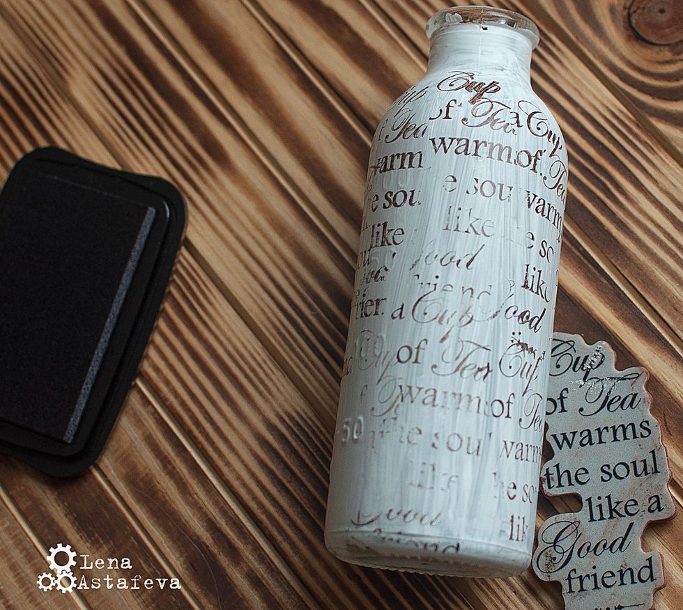 We paint the bottle with acryl paint.We make paintings with stamps.