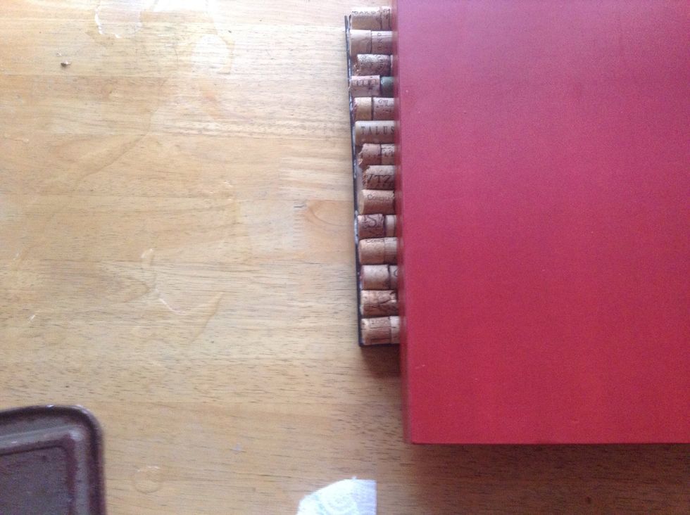 We placed an art case on it to help flatten the board.