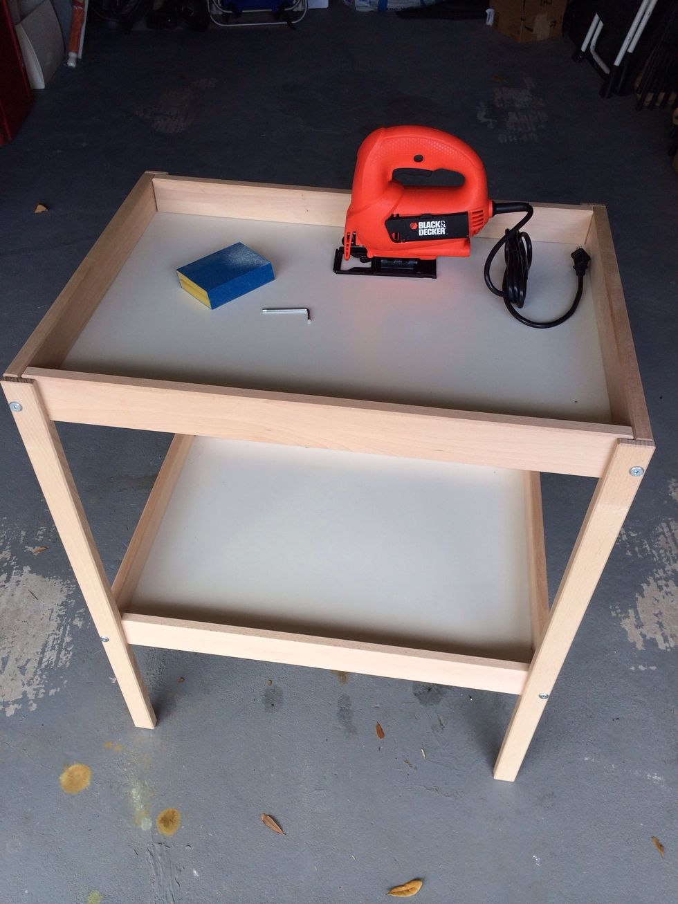 We previously used this $29.99 IKEA Sniglar changing table to change diapers. You could also buy it for the purpose of two very inexpensive play tables!
