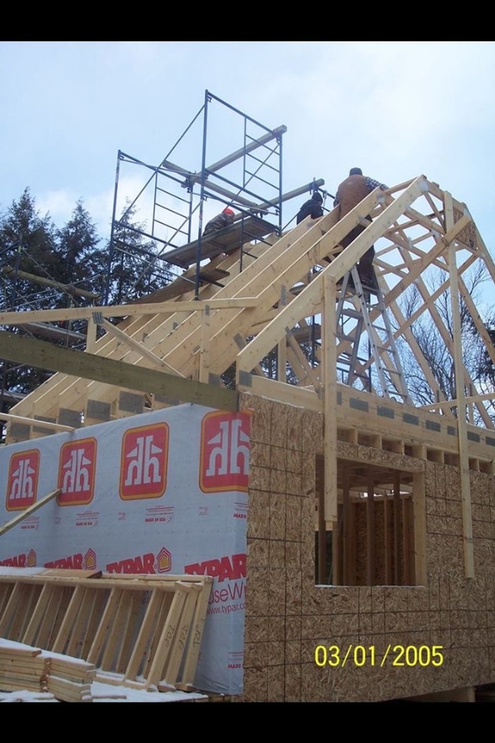 We put the big beam up for the cathedral ceiling.