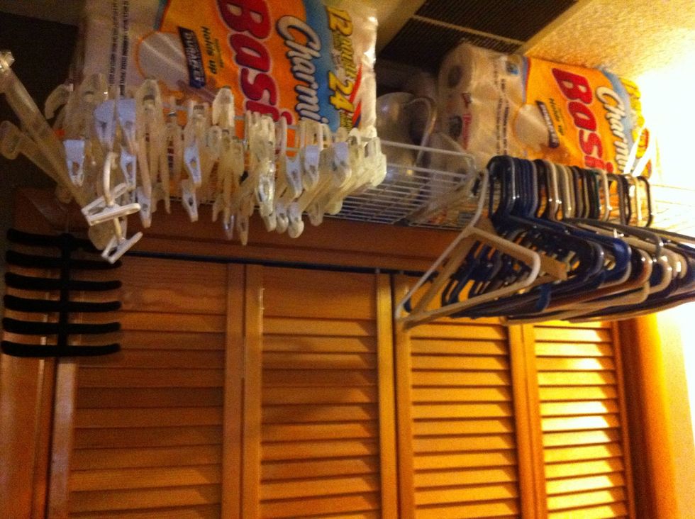 We put up these shelves for extra storage. They make a great place for hangers. It's right by my dryer! Now that's convenient!