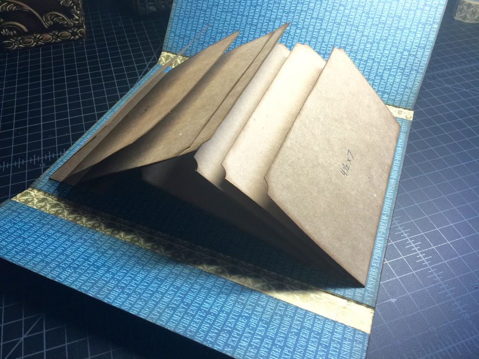 We're done with the top and bottom flaps on the left side of the photo portfolio! Now let's work on the side photo flaps...