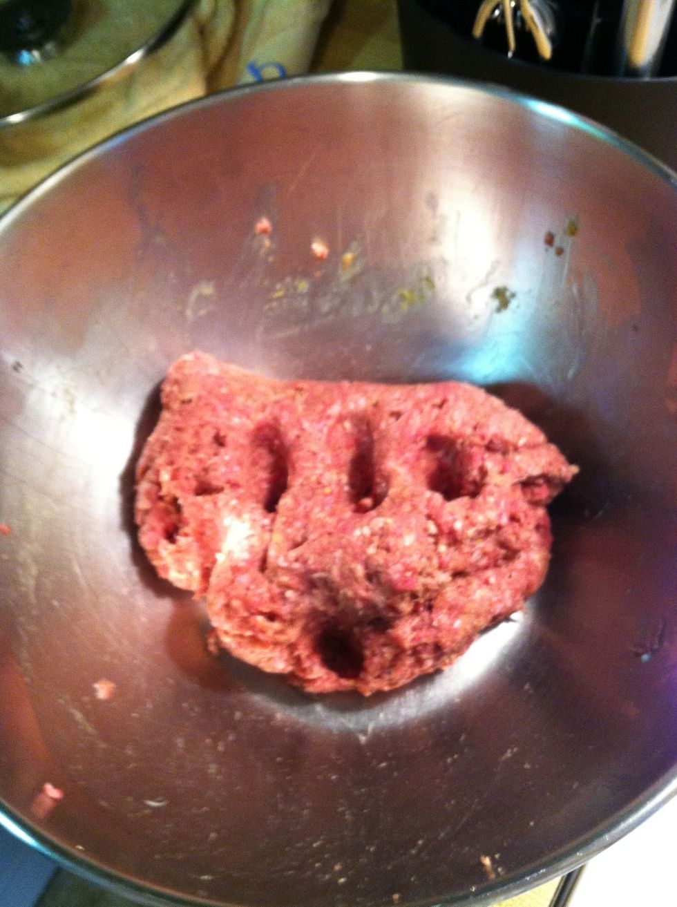 We're ready to roll the meatballs :) You want to make ping-pong sized balls. Grab a handful and roll! (I couldn't take photos of the rolling process-my hands were meaty! Lol)