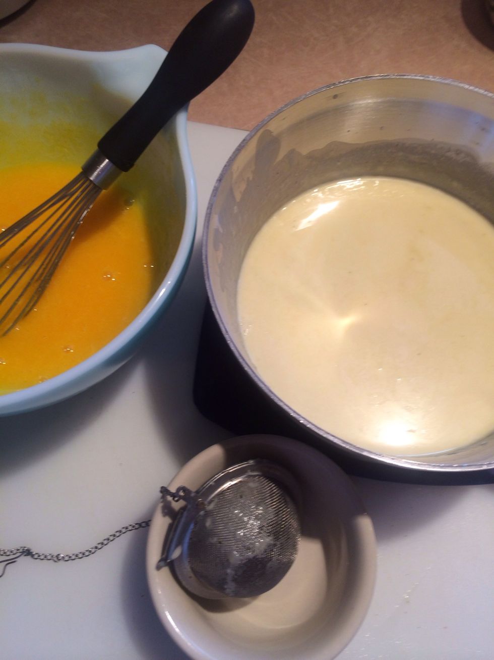 We're ready to temper the eggs with the hot cream.