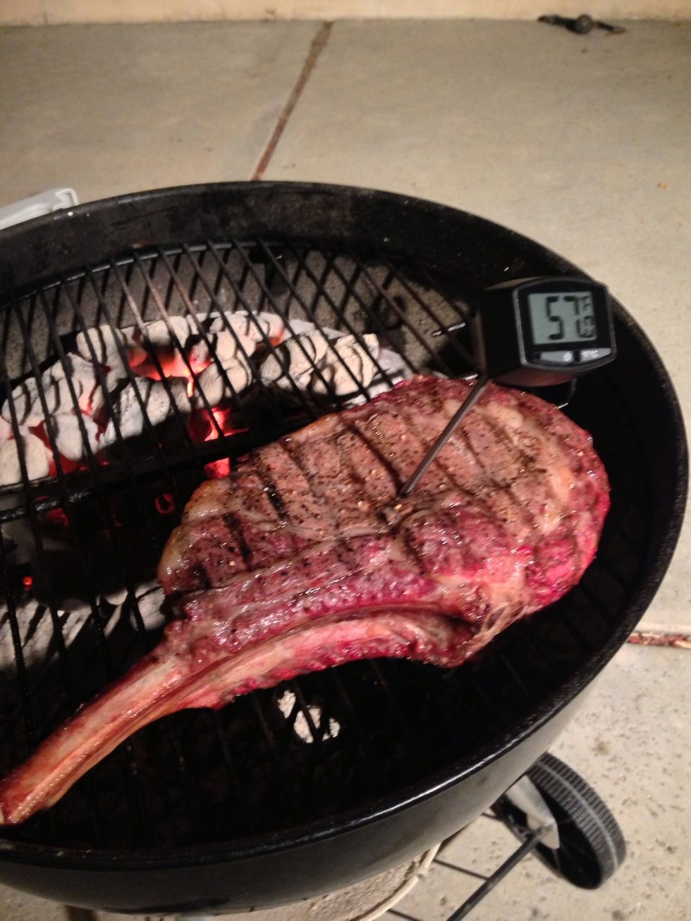 We're using a digital thermometer to hit the perfect temperature before direct heat, 115* for medium rare. Test the thickest part. If you notice uneven cooking, angle your steak appropriately.