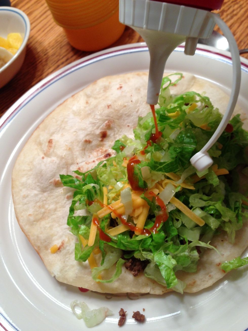 We're wimps when it comes to spicy salsa so we're happy using "Western Dressing" (similar to French) (Note: Tortilla is soft inside and crispy brown outside. Sometimes it will open without breaking)