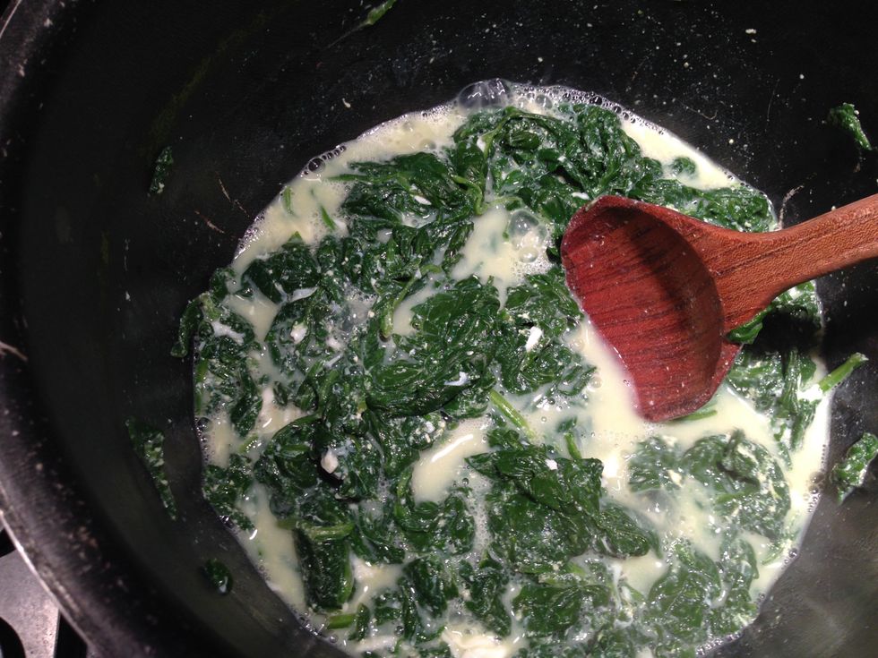 We see it starting to boil again, keep mixing to help the eggs cook.