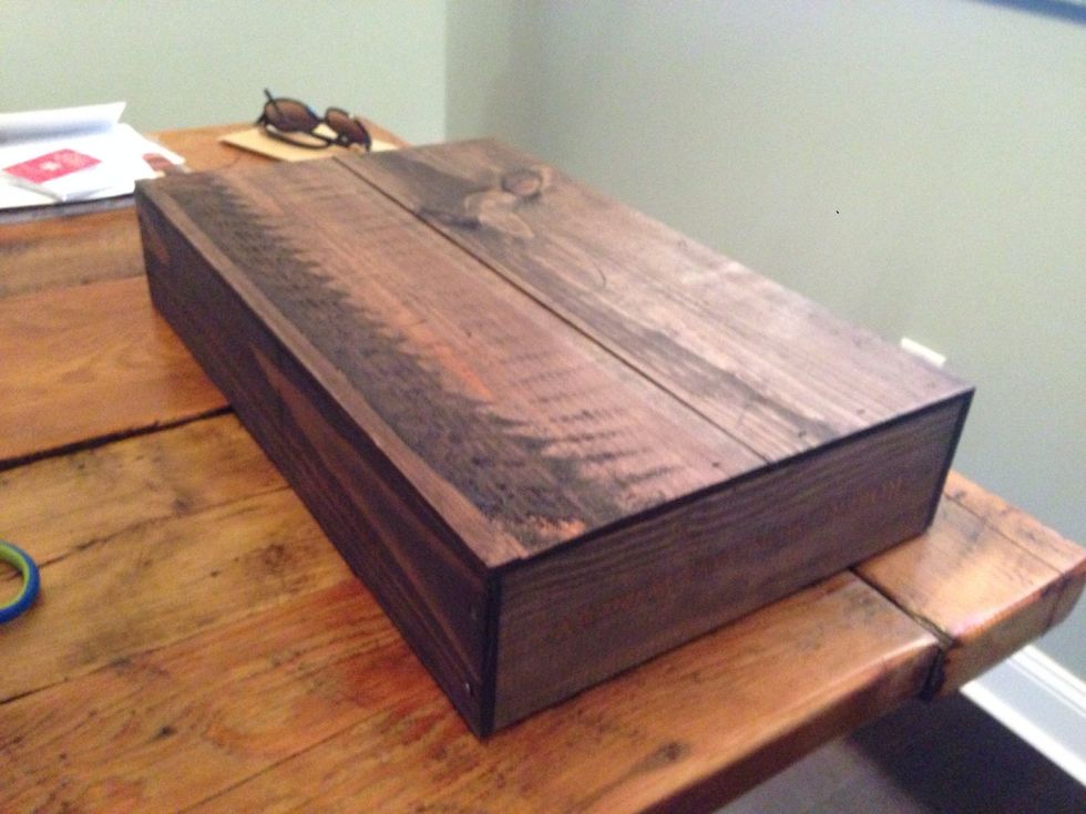 We stained a wine crate we got for free at a liquor store.