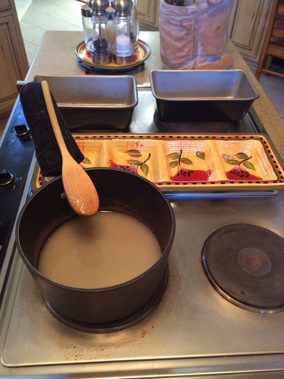 We start by making the caramel sauce that will line pans.  Combine 2 cups sugar with 1/2 cup of water.
