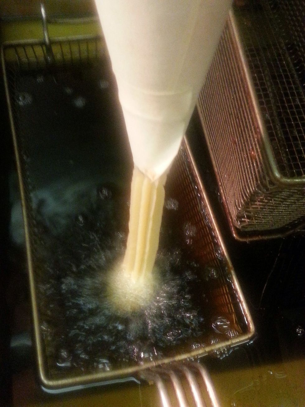 We start frying the churros in oil at 350. You can do it in the stove just adjust your heat so the churros won't burn