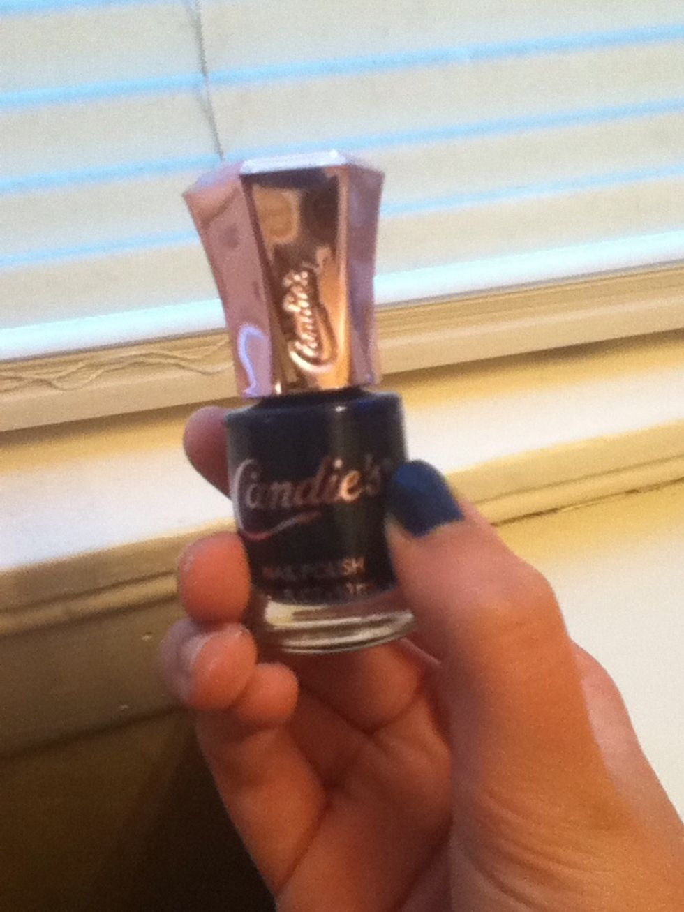 We start with a base polish. I used a dark, iridescent blue, but you could also use black or gray. This is going to be your night sky.