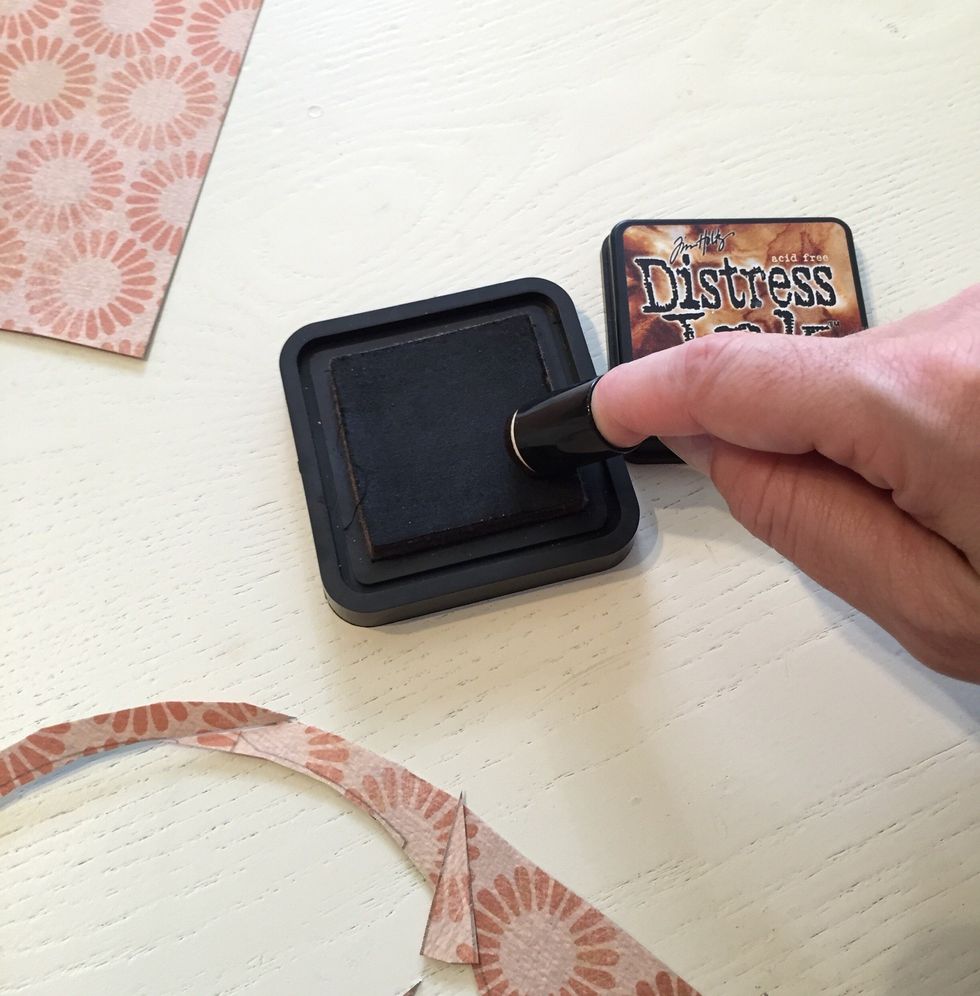 We use Vintage Photo by Tim Holtz. It is the perfect color for any of your projects.