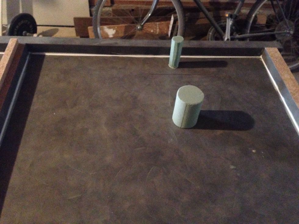 We used styrofoam cut to fit the size of the drain and the faucet we were putting in.