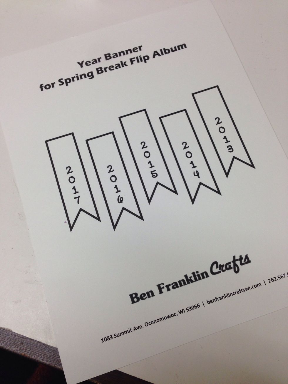 We've provided a FREE printable download if you would like to add a year banner like ours. Download it here: http://goo.gl/FfWQzc, then print and cut out the desired year.