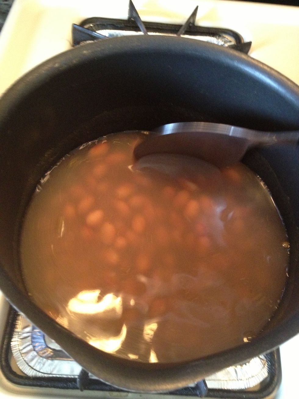 We want to cook this until the beans have softened and some of the water evaporated. They tend to be too hard for my liking( If you like it hard skip this step and just cook for 10 min.)