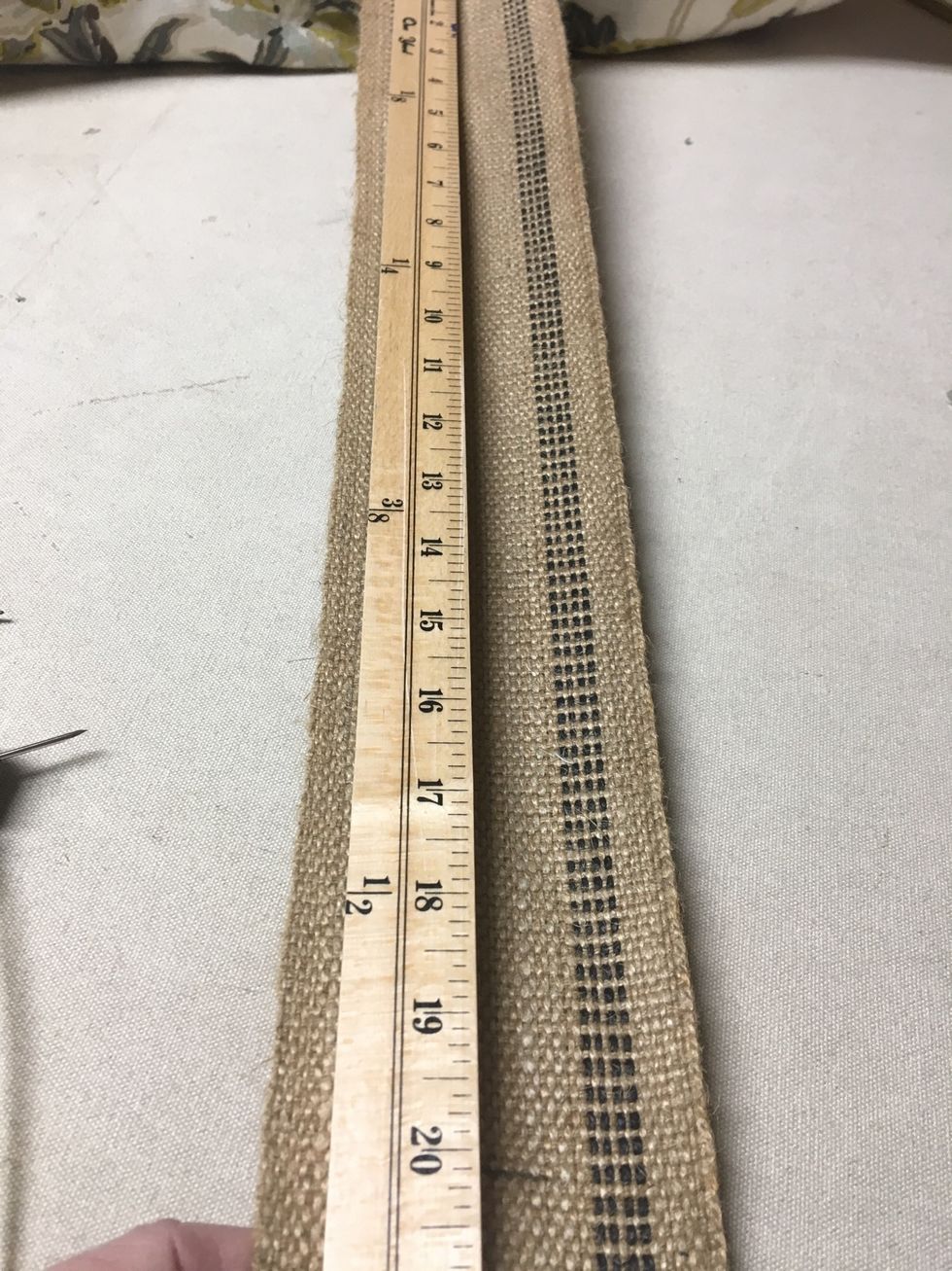 We wanted the next pillow to sit about 20" higher so we measured up 20" on the webbing and marked the placement for the next 4 buttons.