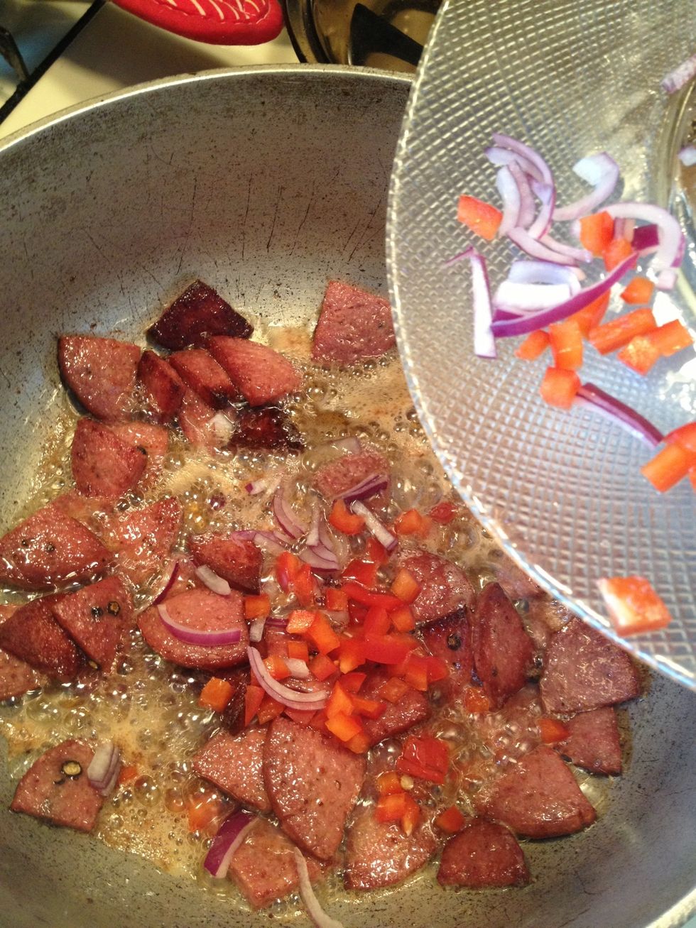We will add the red peppers and onions.
