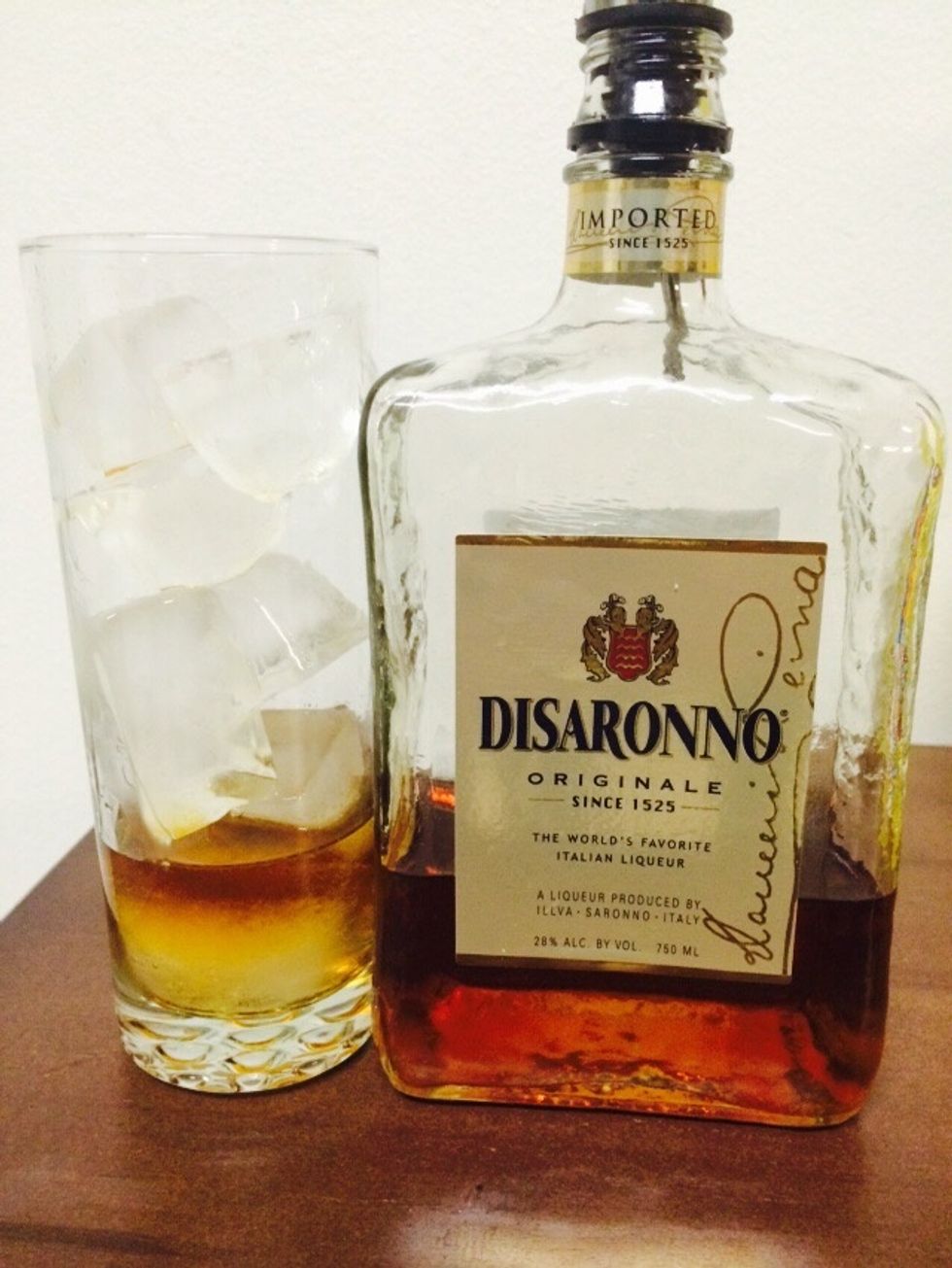 We will begin by adding 1 & 3/4 oz of your favorite Amaretto liqueur. :)