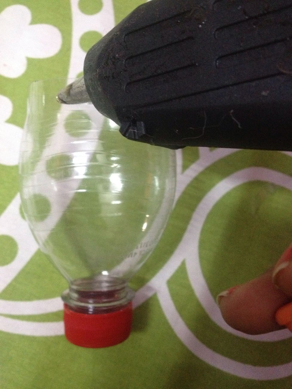 We will drop lil glue on the area where we want to start our decoration using glue gun