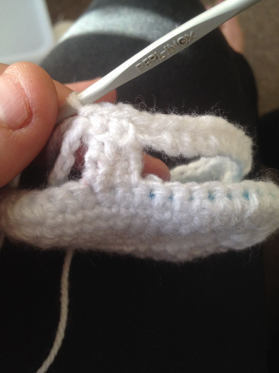 We will stop one stitch before the toe piece