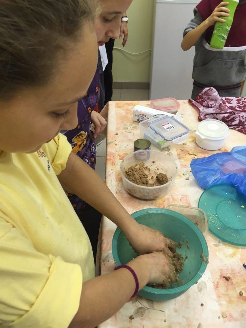 We worked in the mixture with our hands....