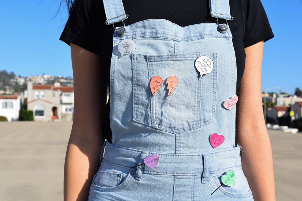 Wear your pins everywhere!  https://www.brit.co/tag/valentines-day/