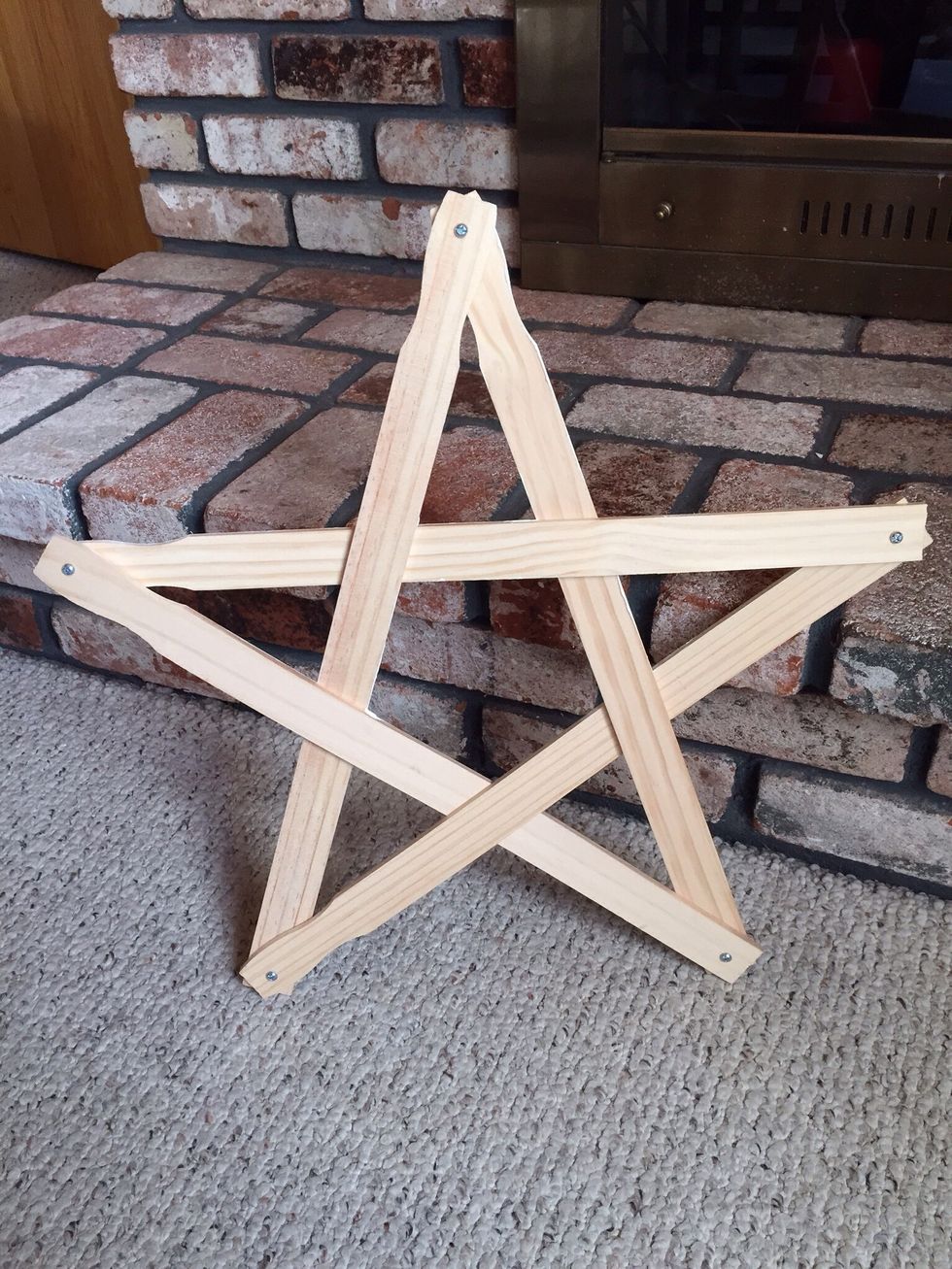 'Weave' the star together, attach each end with bolts, nuts, washers. You must weave the sticks so they will 'lock' into place.