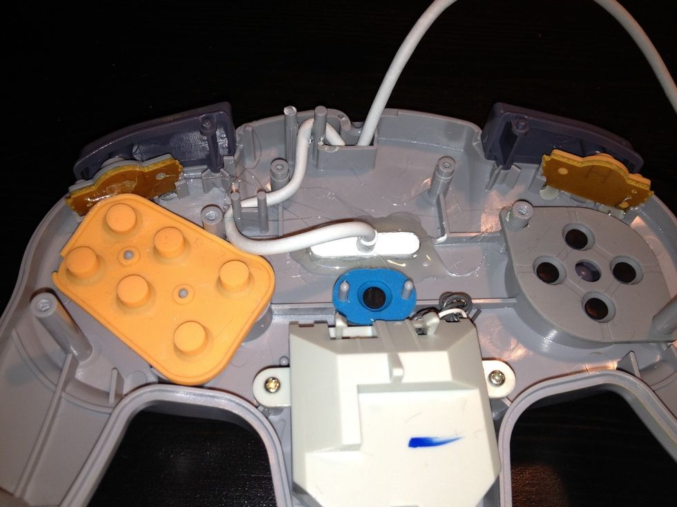 Weave the USB where the original controller was weaved so the controller can be closed properly without harming the USB cord.