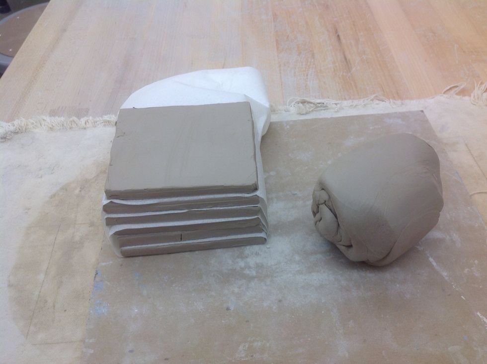 Wedged clay and stack are wrapped in plastic over night.