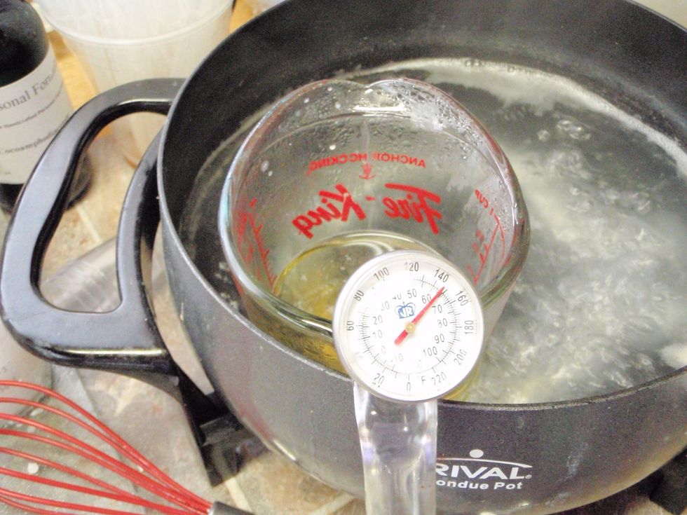 Weigh all ingredients - 33 grams each butter, oil, and beeswax - in a heatproof container and heat until melted. (This recipe CAN'T be converted into volume measurements!)