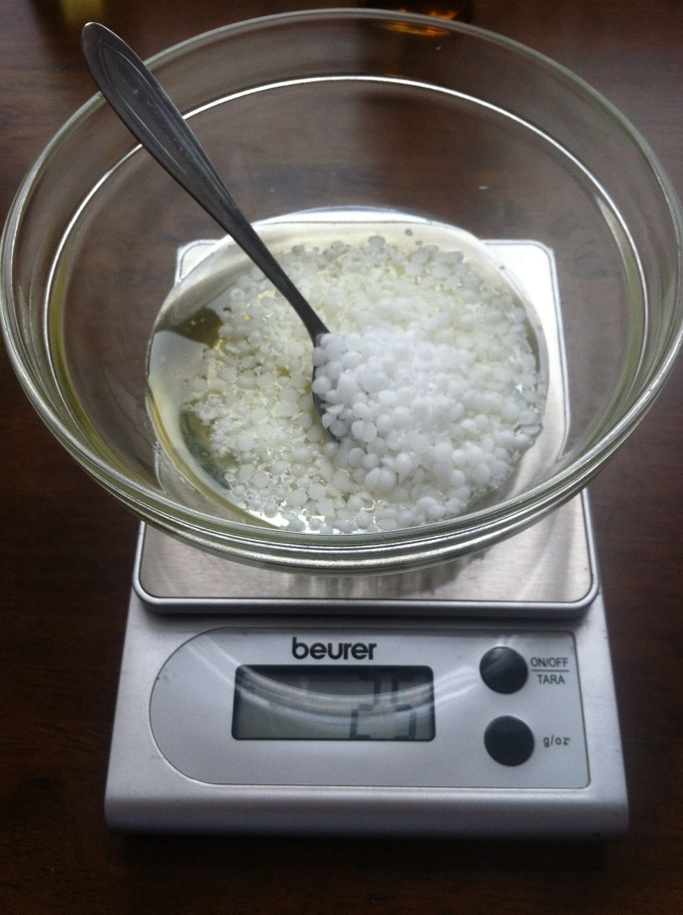 Weigh all of your oils and wax into a glass bowl.