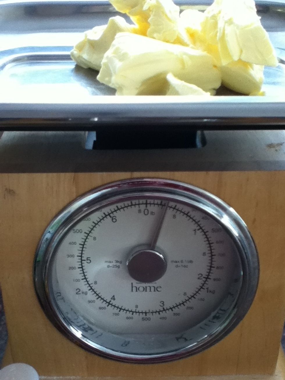 Weigh out 125g butter and add to the bowl.