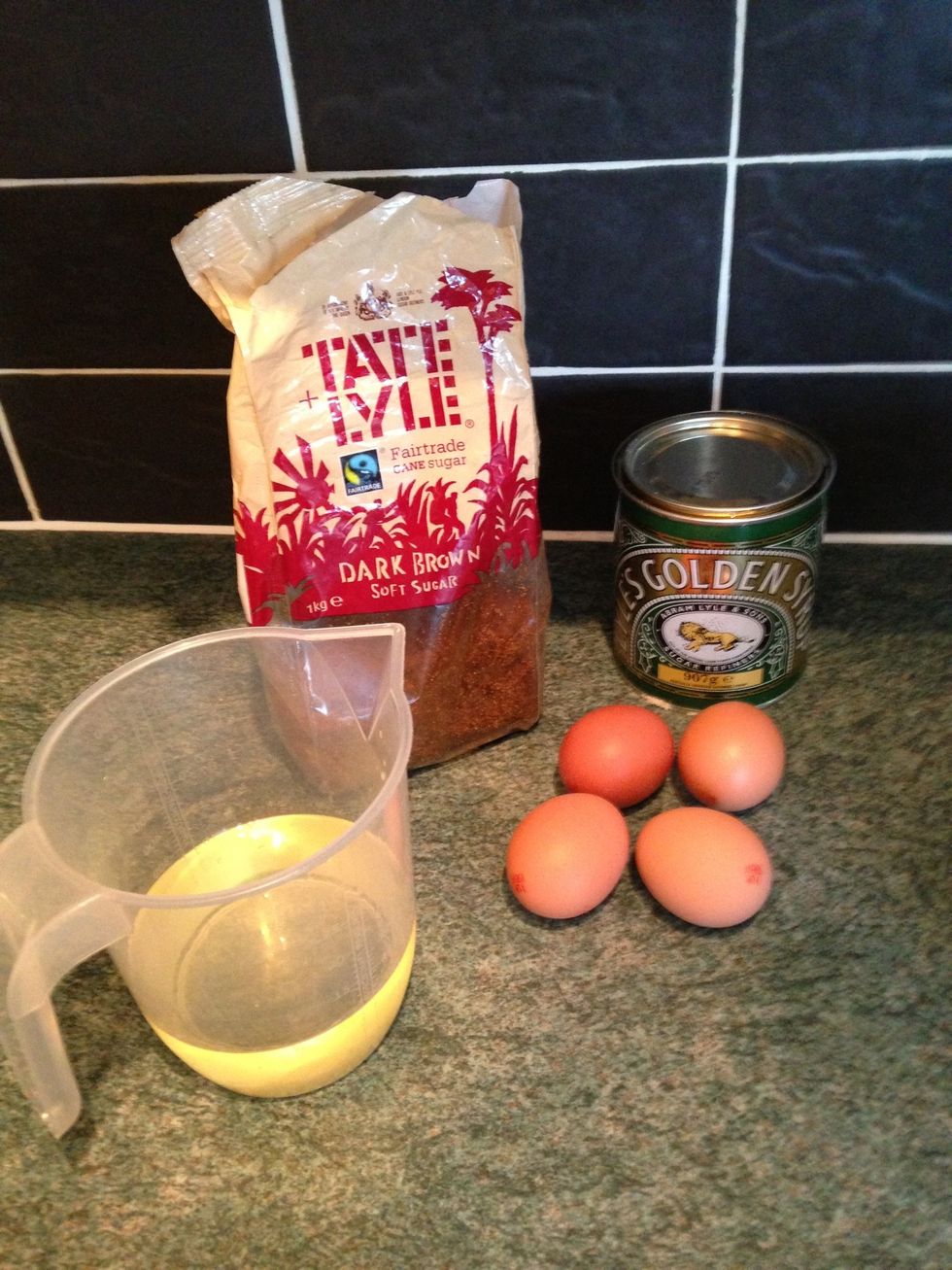 Weigh out the oil, sugar, golden syrup and gather your 4 eggs