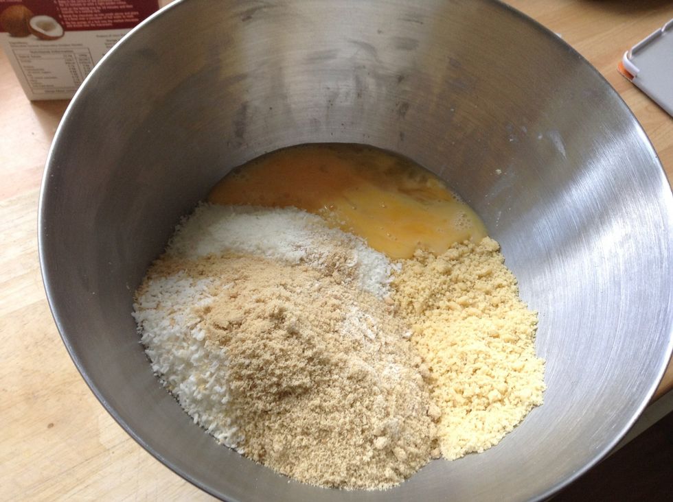Weigh out your coconut,sugar and pour in the mix along with the eggs and milk