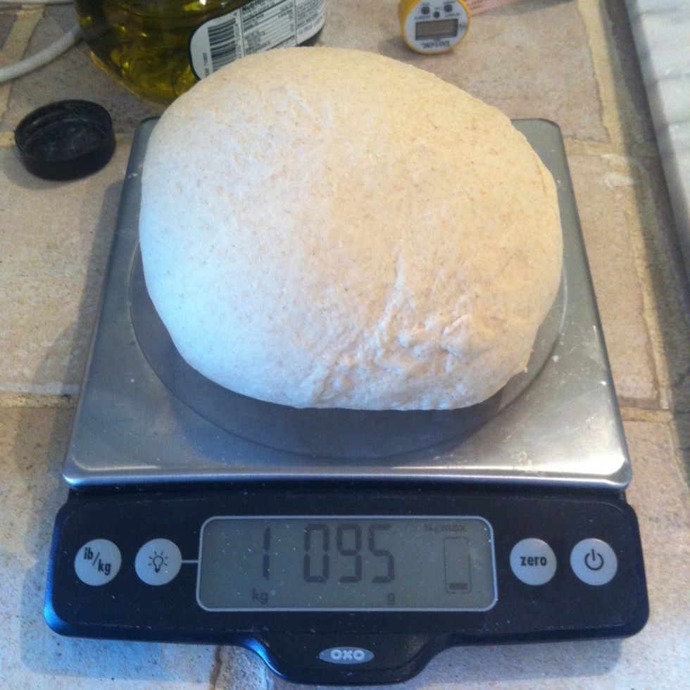 Weigh the dough ball so we can split it into three smaller balls.