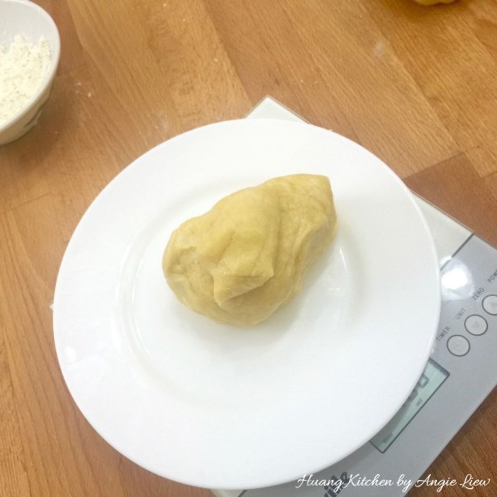 Weigh the dough if you have a weighing scale so you can get a perfect half. Otherwise, just eyeball it to get 2 halves.