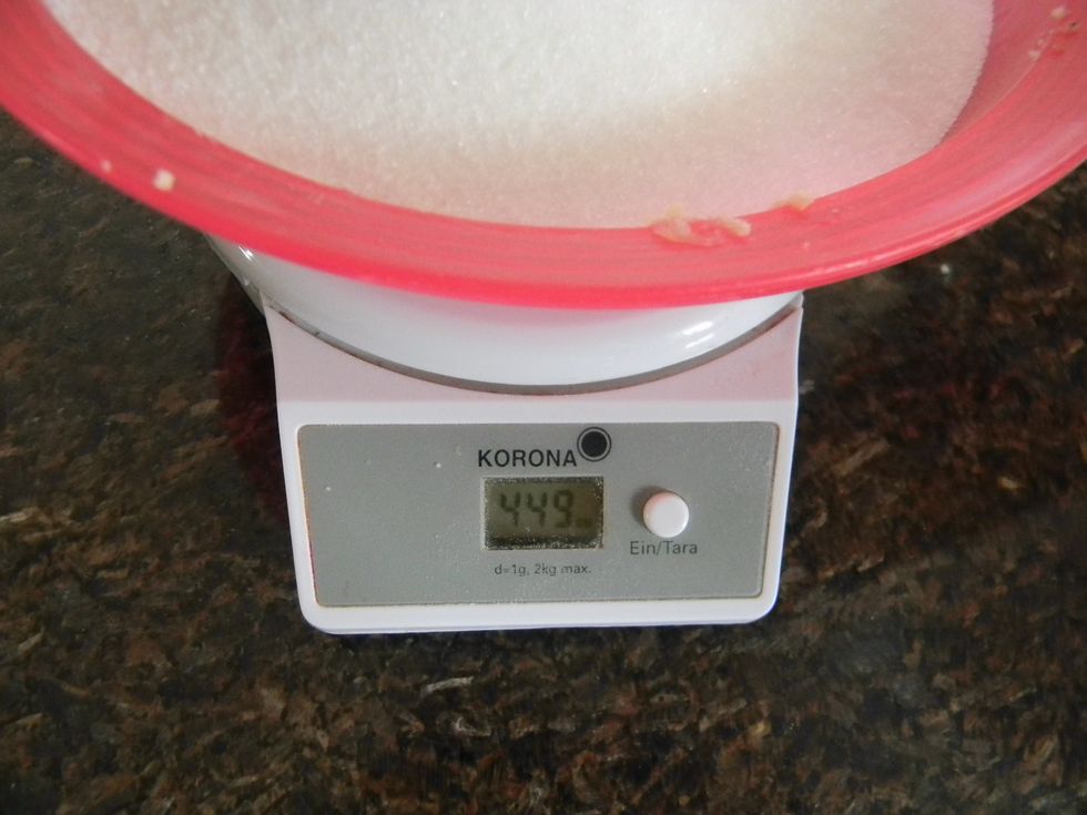 Weigh the sugar.